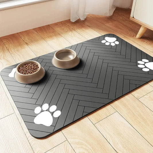 Absorbent pet feeding mat with paw print design